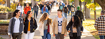 Students are walking on the Logan campus
