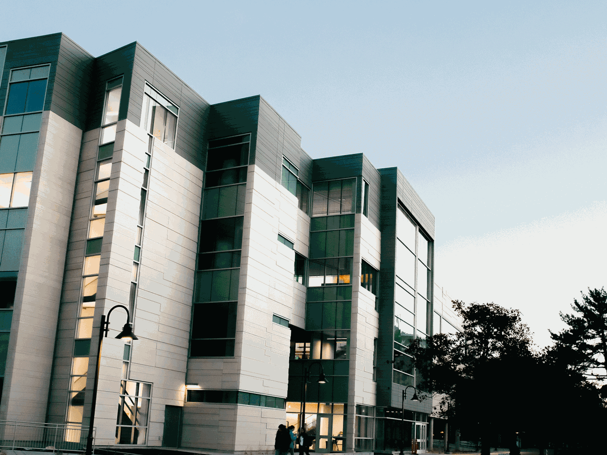 The exterior of the USU Life Sciences Building at night.