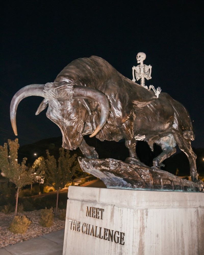 A skeleton rides atop the "Meet the Challenge" statue
