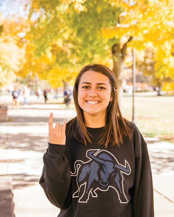 student wearing Aggie gear