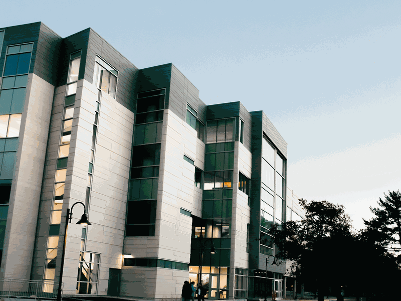 The exterior of the USU Life Sciences Building at night.