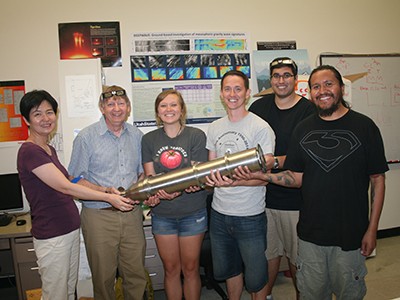 USU physicists with imager
