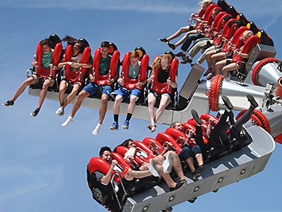 students on an amusement ride during USU's Physics Day at Lagoon