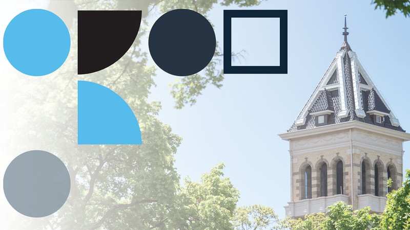 Several symbols are superimposed over a photo of Old Main.