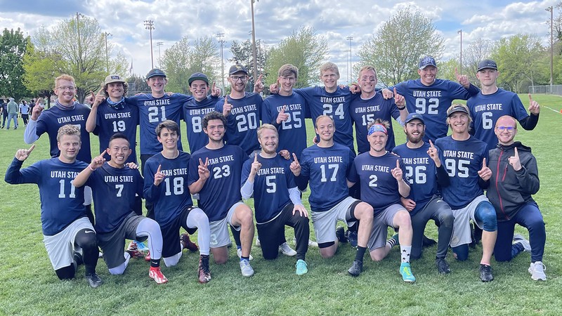 The Utah State University men’s ultimate club poses for a team photograph after winning the 2022 Nor