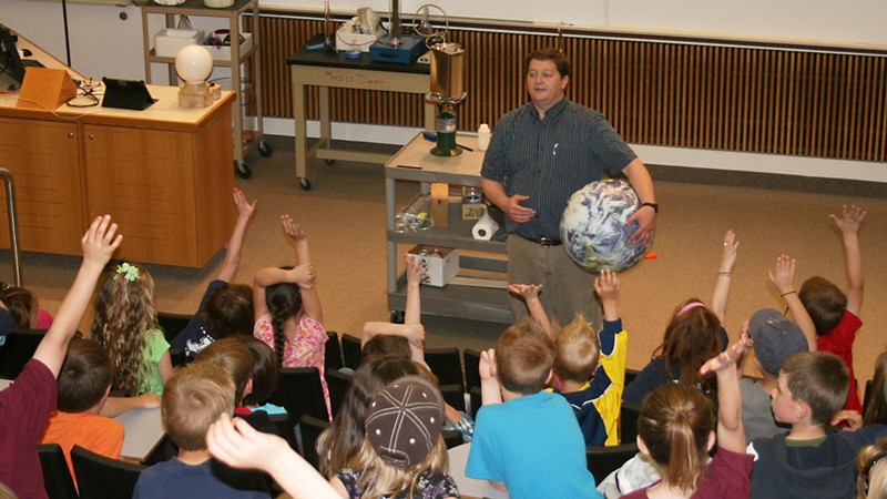 A physicist demonstrating physics.