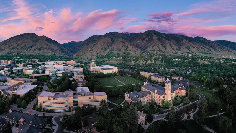 USU's Logan Campus is seen from the air at dusk.