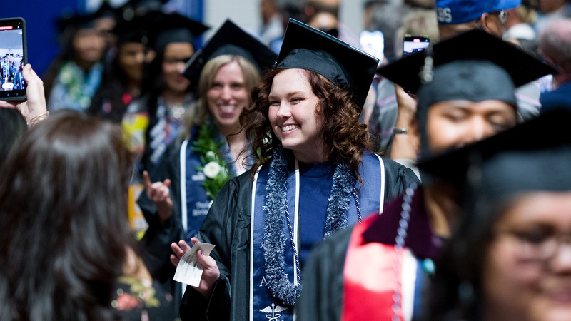 Graduate walks down the aisle