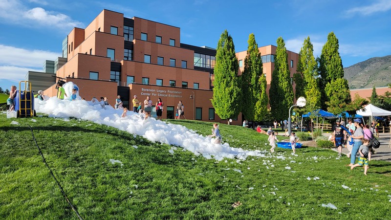 Children playing in a pile of bubble foam.