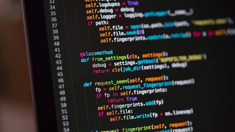 A computer screen displaying programming code.