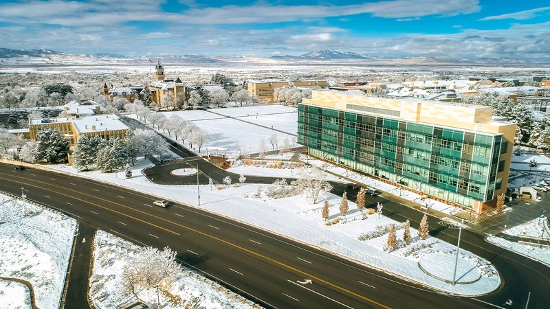 An aerial view of the southwest side of the USU Logan Campus in winter.