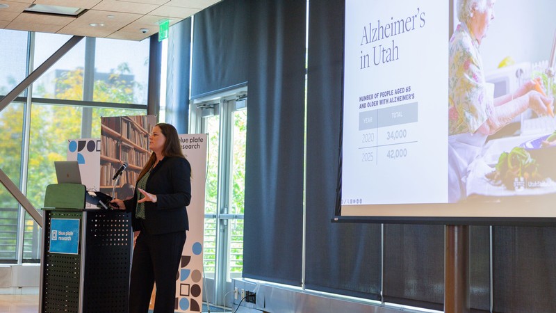 Beth Fauth speaking during a presentation.