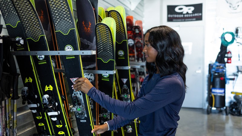 A person working in a ski shop.