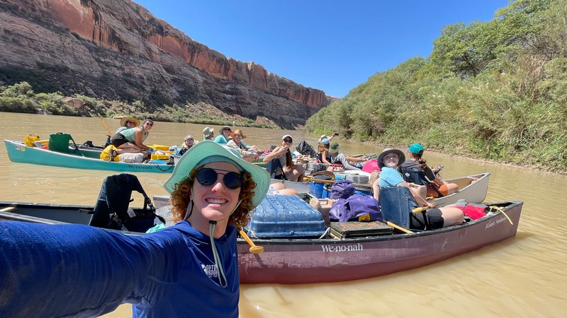 Students in canoes on a river.
