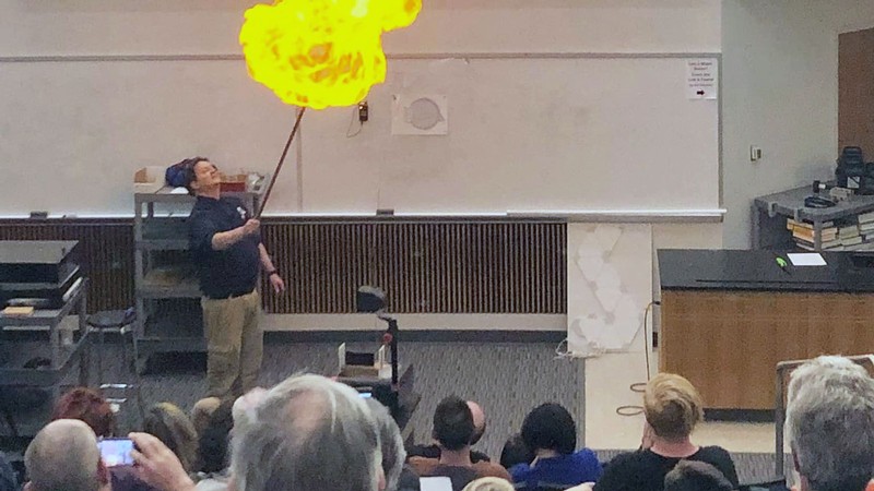 USU physicist James Coburn demonstrating physics with a large fireball.
