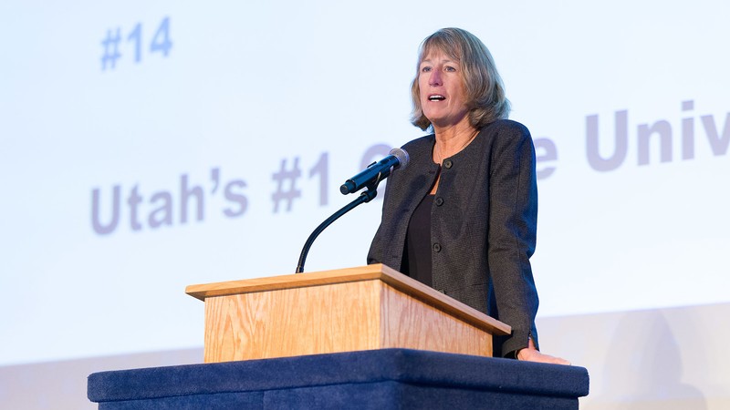 Noelle E. Cockett speaks at a podium.