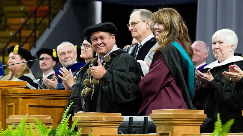 Honorary degree recipients at the rostrum at commencement in 2024.
