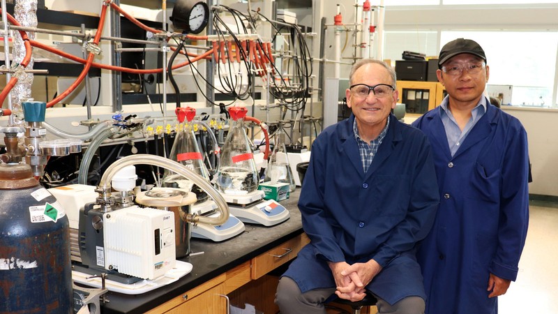 USU biochemists Lance Seefeldt and Zhi-Yong Yang in a lab.