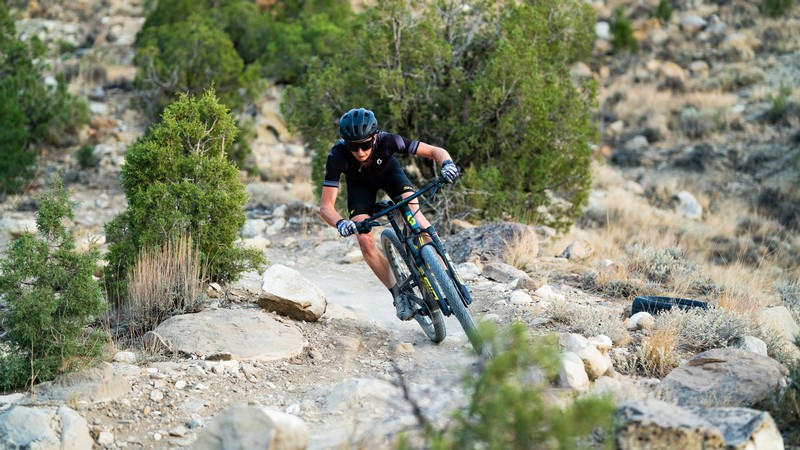 A person riding a mountain bike.