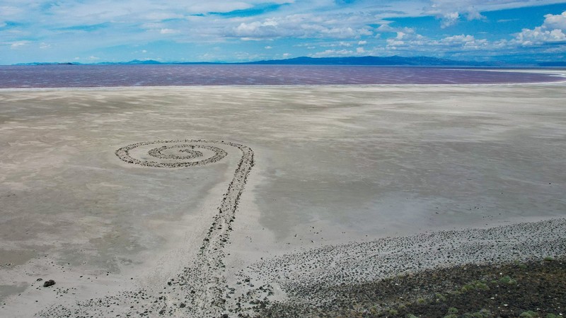 A spiral design made of rocks on the dry bed of The Great Salt Lake.