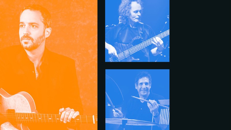 A concert poster with a guitar player, a bass guitar player and a drummer.