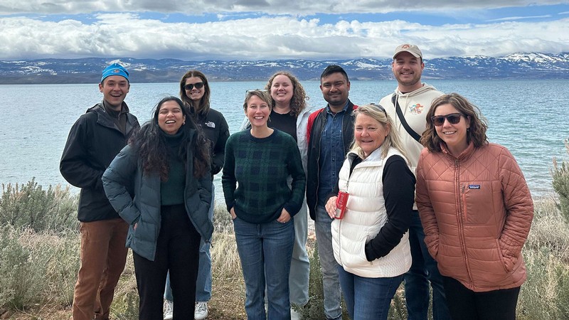 Jessica Schad and other researchers standing on the shores of Bear Lake.