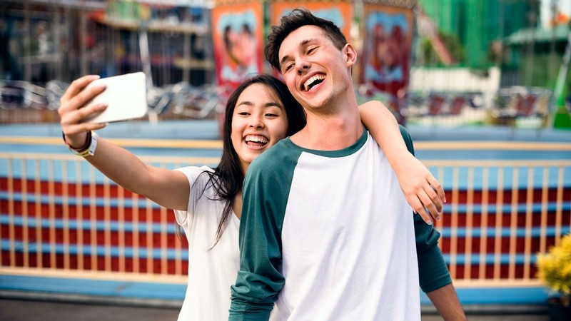 A couple taking a selfie.