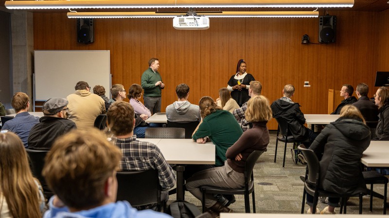 Two people giving a lecture.