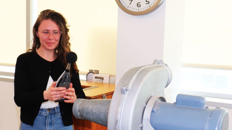 Industrial hygienist samples noise level of equipment.