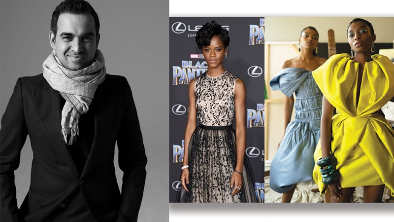 Bibhu Mohapatra is seen next to some of his fashion designs.