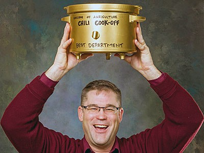 Mike Bishop with the Chili Cookoff trophy
