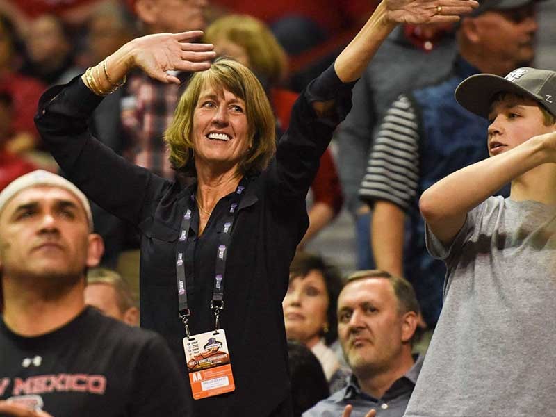 USU President Noelle Cockett cheers on men's basketball team