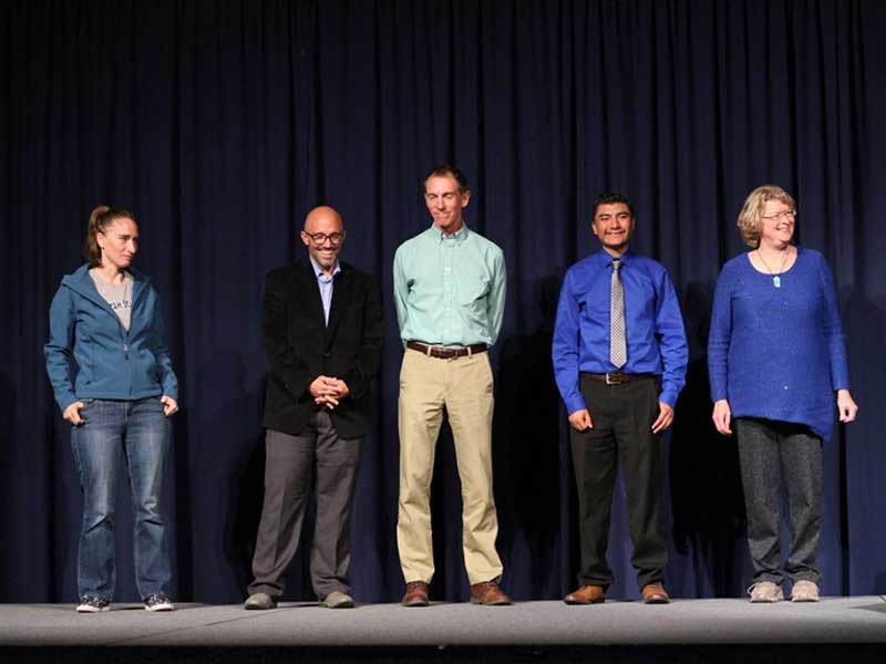 Aggie Heroes gathered together on stage.