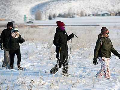a group of snowshoers at the Swaner Preserve
