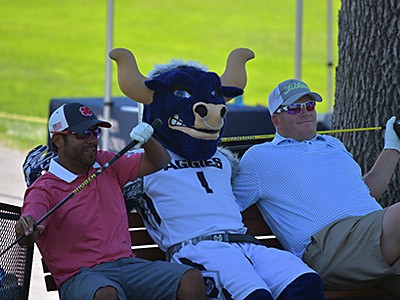 USU alums and Big Blue take a break at the Alumni Golf Tournament