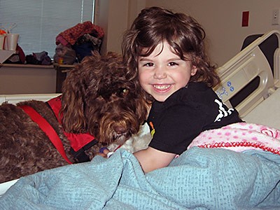 a child and therapy animal