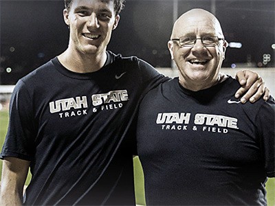 USU track and field distance coach Steve Reeder with an athlete