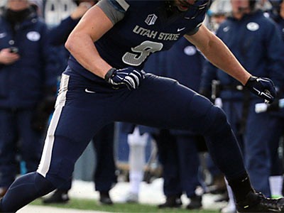USU football player Kyler Fackrell in action