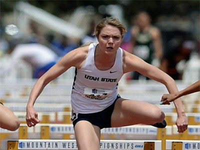 USU athlete Chari Hawkins in competition