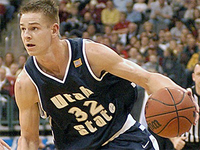 Aggie basketball player Spencer Nelson on the court playing