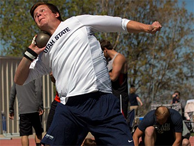 a member of USU's track and field team competing