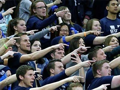 the student section during a Utah State basketball game