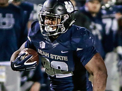 a USU football player in action
