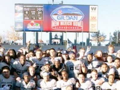 a portion of Utah State's 2015 bowl champtionship football team