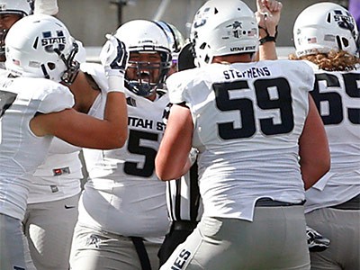 Utah State University football players