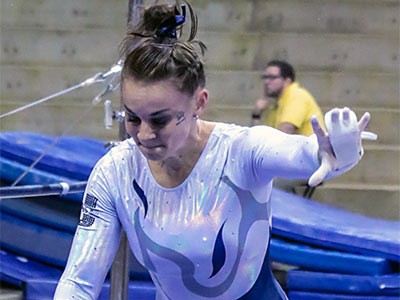 a USU gymnast in action