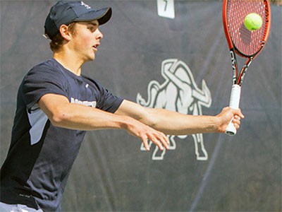 a Utah State men's tennis player in action