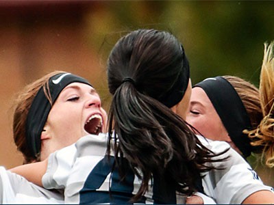 Utah State University women's soccer players celebrating