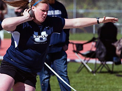 an Aggie track and field athlete in competition