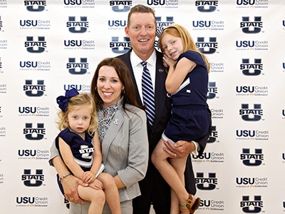 John Hartwell, USU athletics director and his family